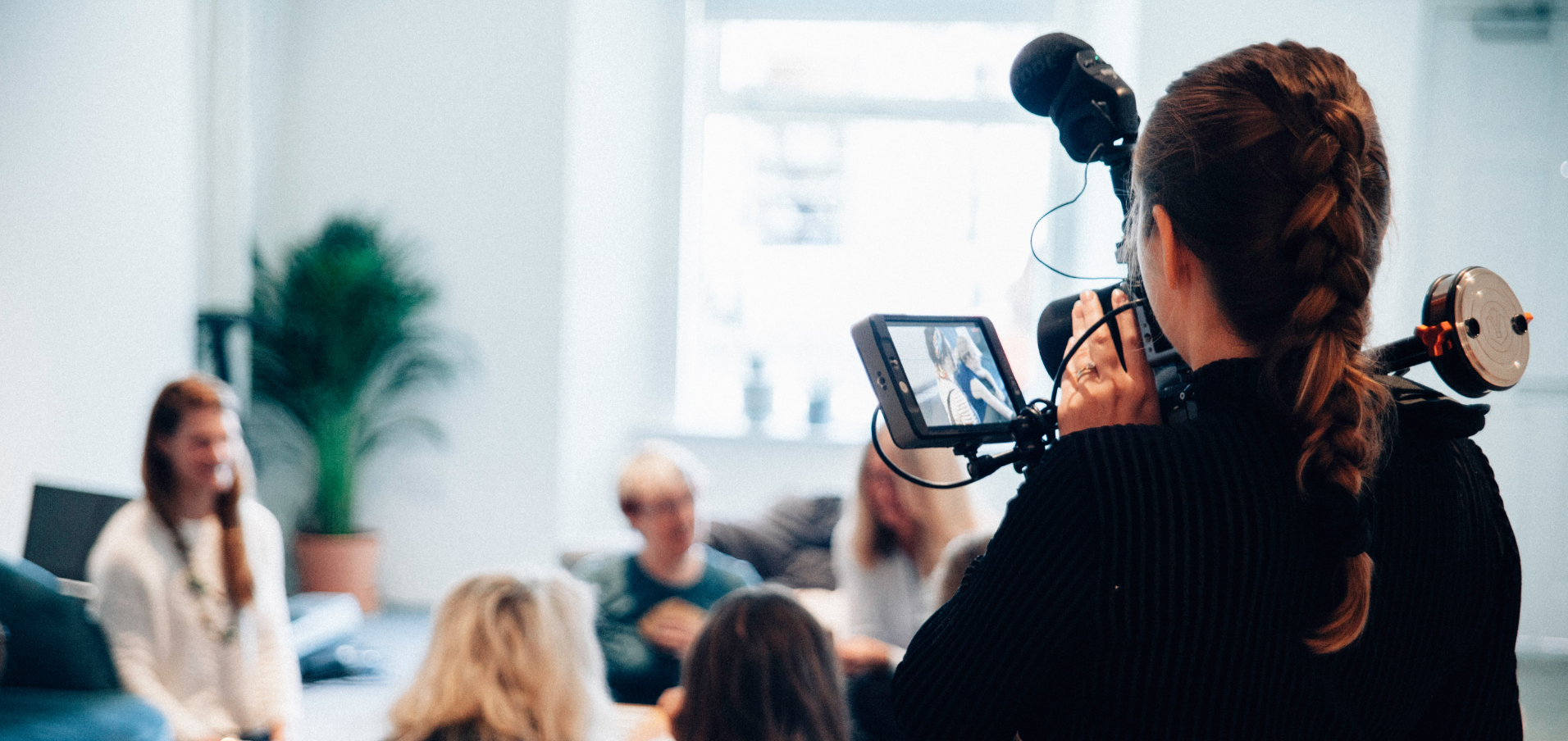 a camerawoman filming