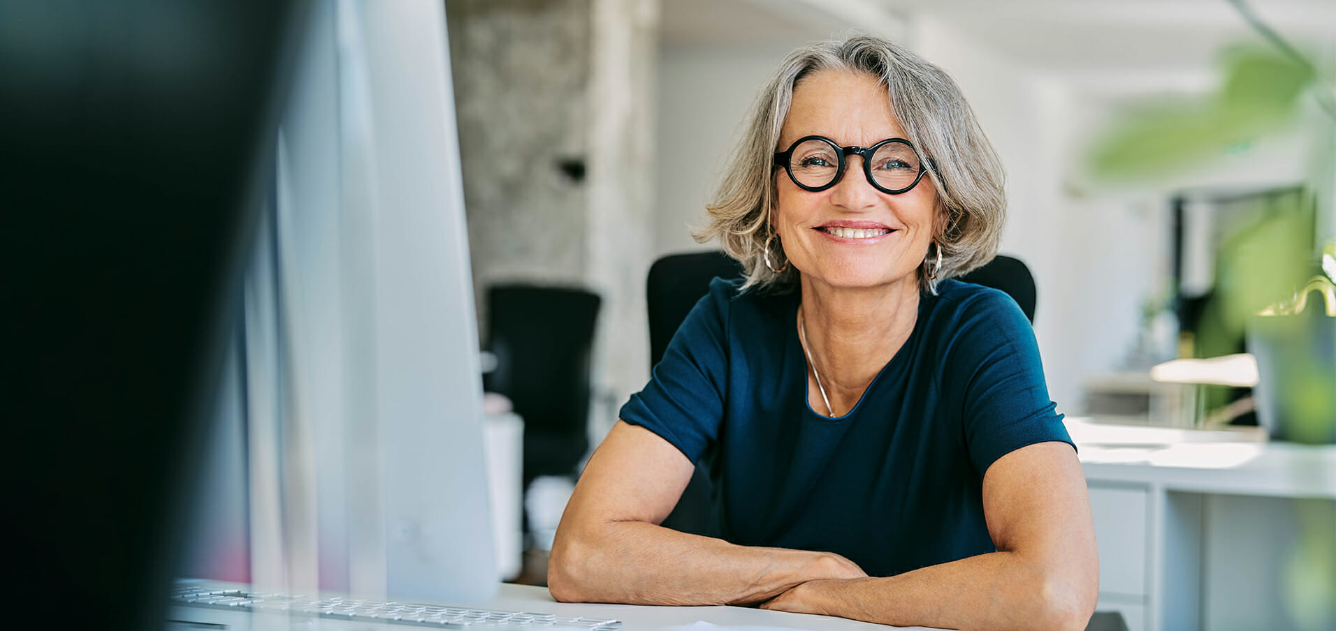 smiling business woman in office