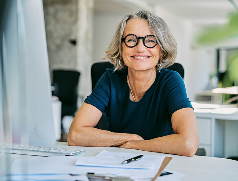 smiling business woman in office