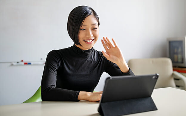 Female professional making a video call in office