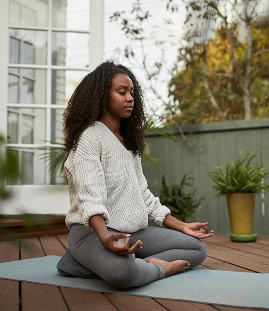 Woman meditates sitting