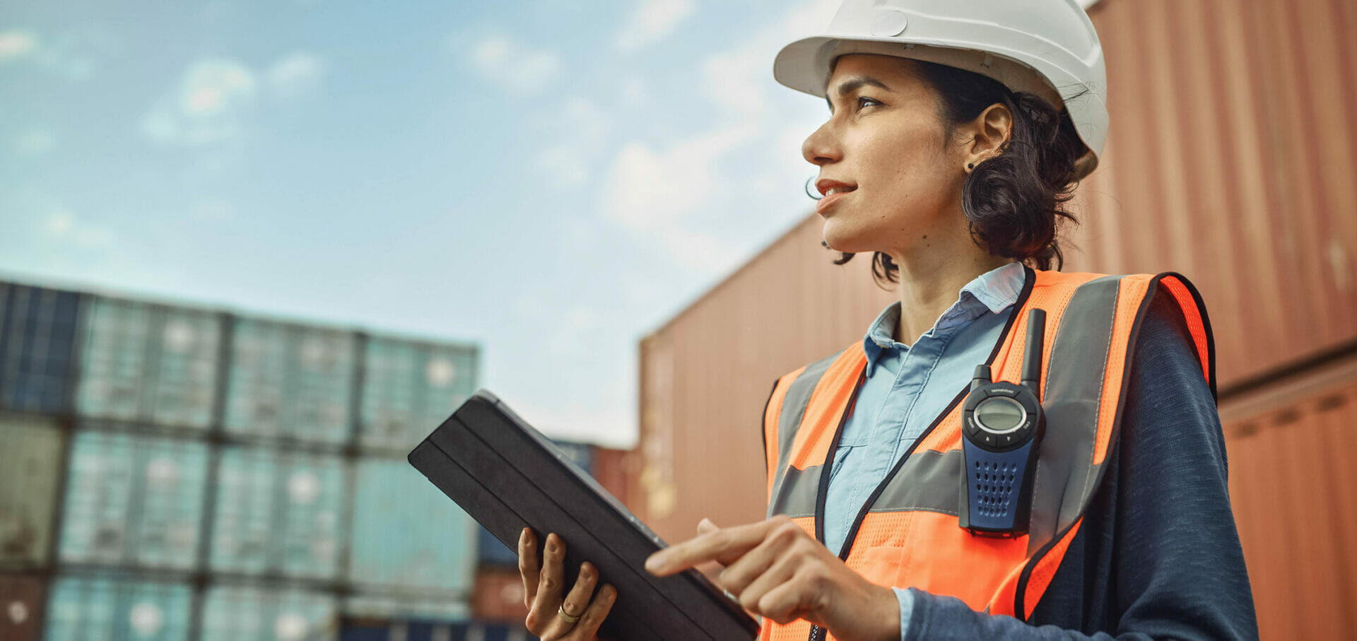 Construction worker with tablet in hand