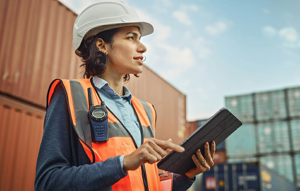 Female Industrial Engineer holding a tablet