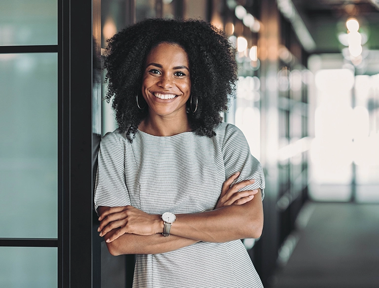 Smiling, confident businesswoman