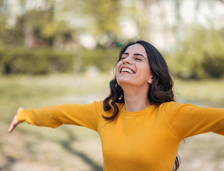 Joyful woman in nature