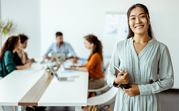 Confident young businesswoman smiling