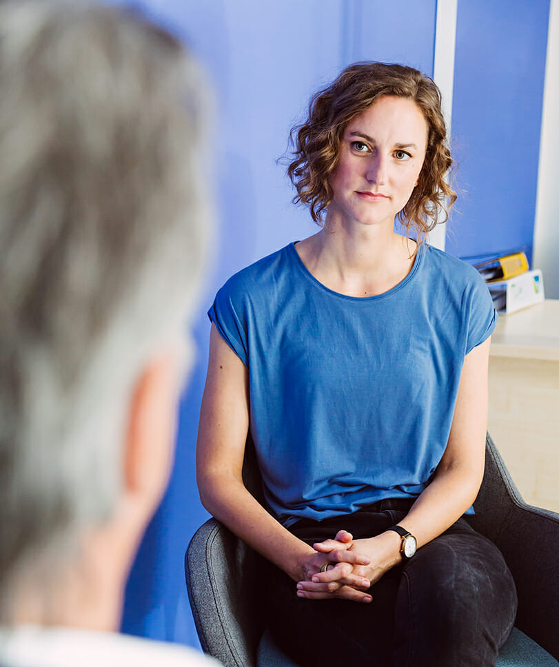 Woman sitting in a consultation