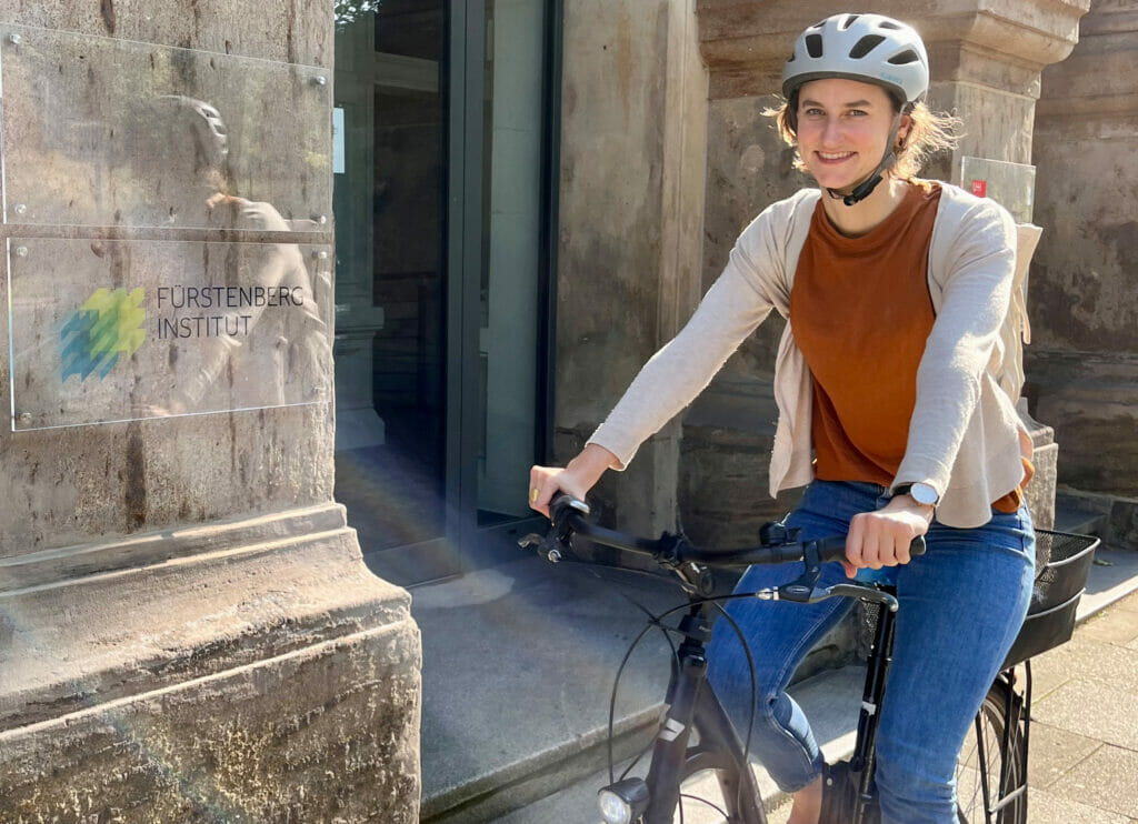 a woman on a bicycle