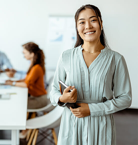 Confident young businesswoman smiling