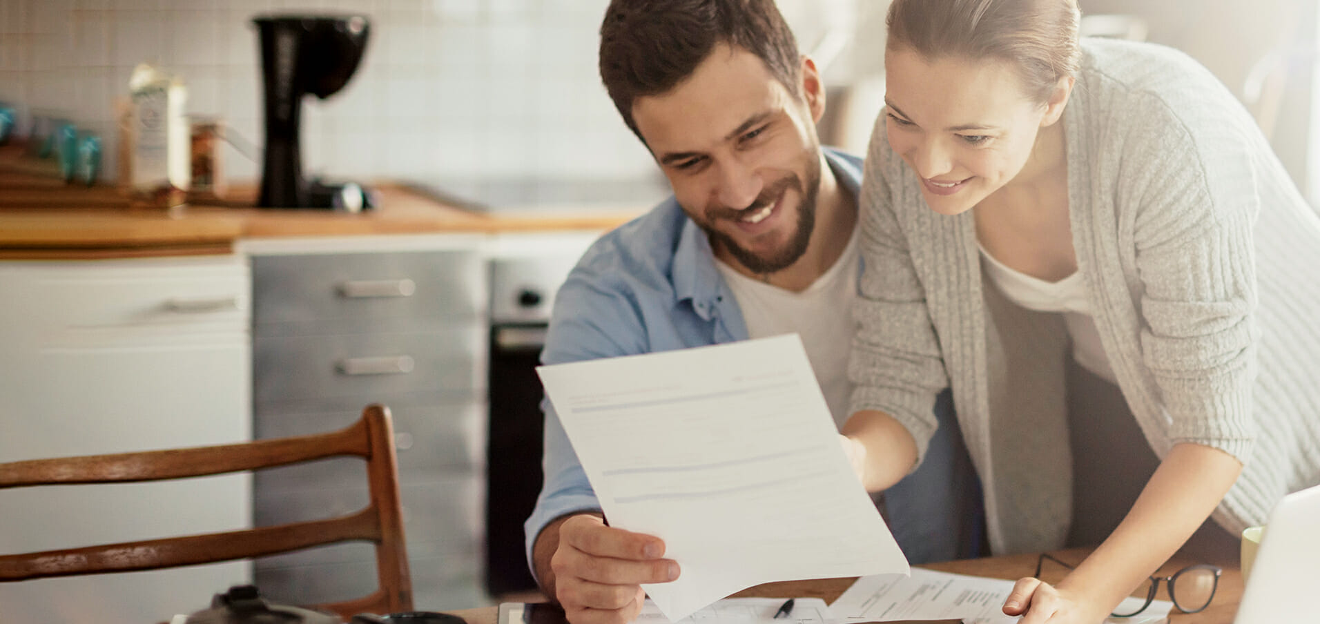 Young couple calculating home finances