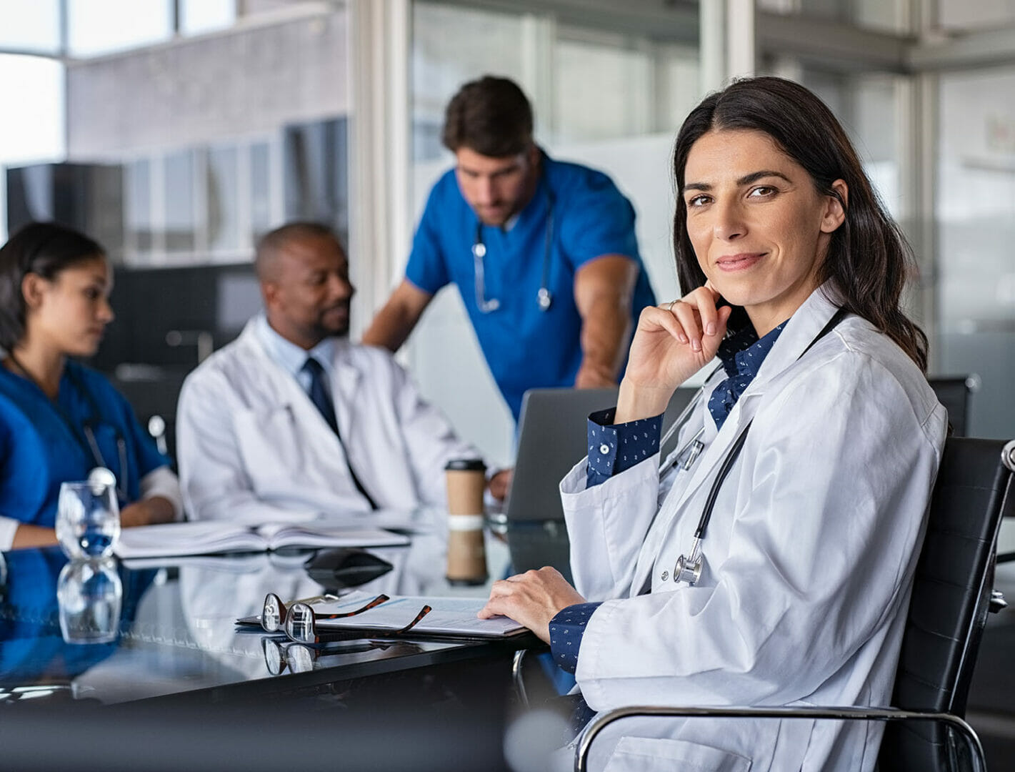 Friendly doctor in a meeting